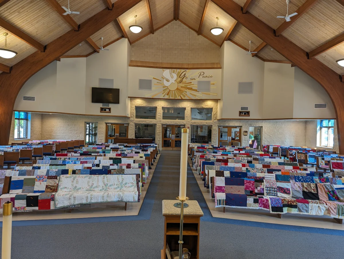Photo of LWR quilts in sanctuary
